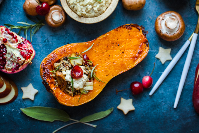 FESTIVE + Flavorful Roasted Butternut Squash stuffed with quinoa, vegan sausage, mushrooms, sage, and easy almond ricotta | The perfect side dish for your holiday dinner | Hearty enough to be a vegan main course