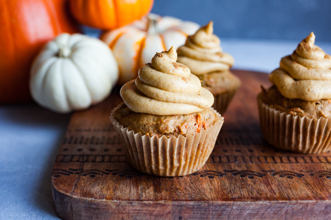 DELICIOUS secretly healthy vegan carrot cupcakes! Whole-wheat, naturally sweetened with fruit, this easy dessert recipe is kid-friendly and perfect for holidays