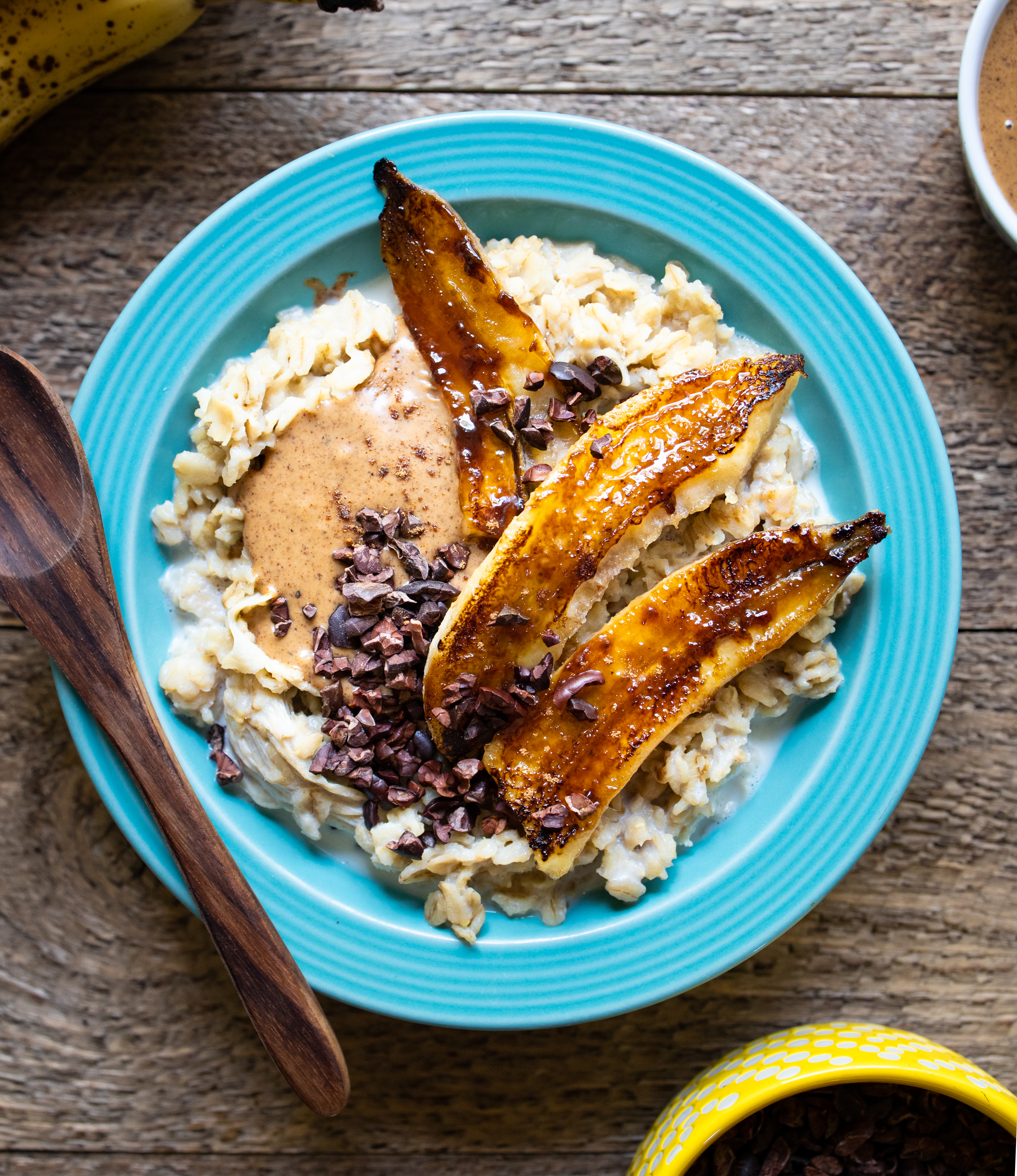 High-Performance Caramelized Banana Oatmeal | Vegan Plant-Based Breakfast | Topped with hemp, cacao nibs, and mixed nut butter