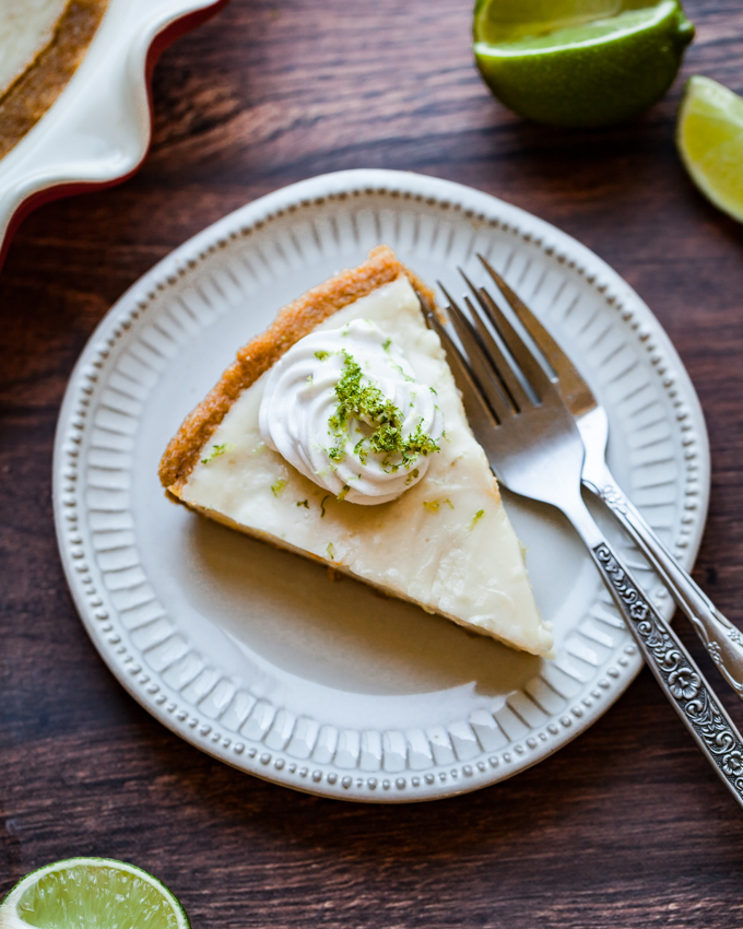 The best vegan key lime pie in a graham cracker macadamia crust. Topped with coconut whipped cream for a classic summer dessert. Recipe by a Key West native!