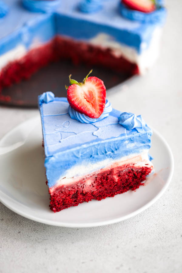 Looking for a show-stopping and easy vegan dessert? Try our indulgent Vegan Red Velvet Ice Cream Cake recipe! Made with a box cake mix and clever vegan swaps, this chilled delight features alternating layers of creamy macadamia ice cream infused with blue spirulina. Perfect for satisfying your sweet tooth on hot summer days. #EasyVeganRecipe #DessertIdeas #IceCreamCake