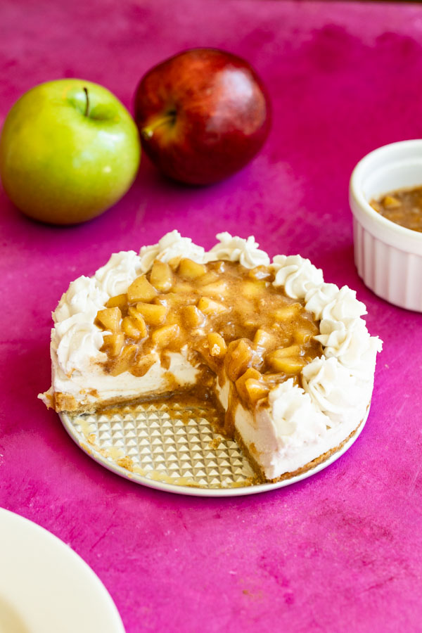 Whip up a decadent Vegan Salted Caramel Apple Cheesecake with just 9 ingredients—no baking required. This recipe features a crunchy graham cracker crust topped with a creamy, rich apple and caramel layer. It's the perfect combination of simplicity and luxury, ideal for impressing at any gathering or treating yourself to a gourmet dessert at home. Save this for a go-to vegan delight that's as delicious as it is easy to make. #VeganCheesecake #NoBakeDessert #EasyVeganDessert #SaltedCaramel #AppleCheesecake